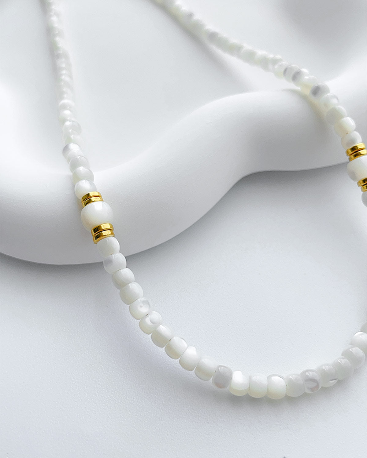 Collier de perles de coquille de trochus Happy Glow