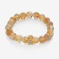 Daisy Rondelle on Golden Healer Quartz Bracelet