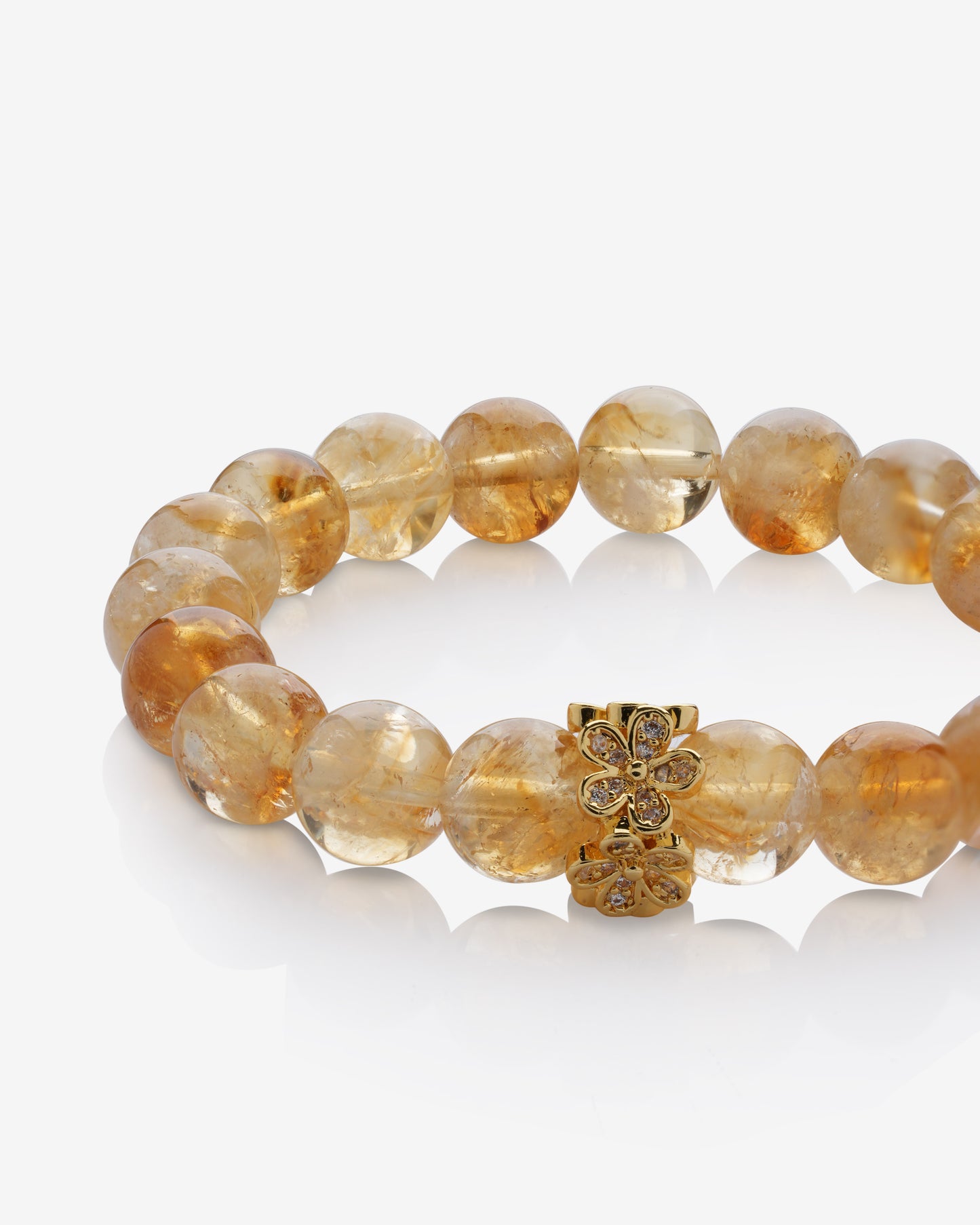 Daisy Rondelle on Golden Healer Quartz Bracelet