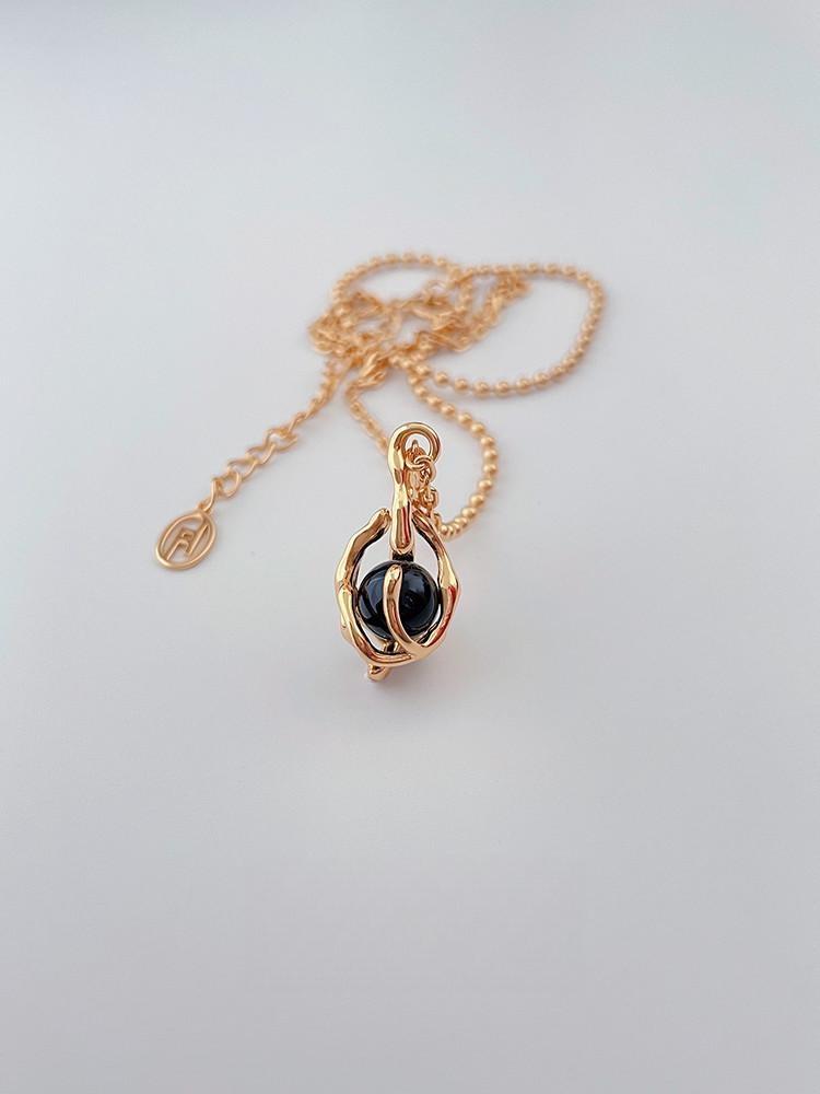 Heartbeat Elegance: Black Onyx Pendant Necklace