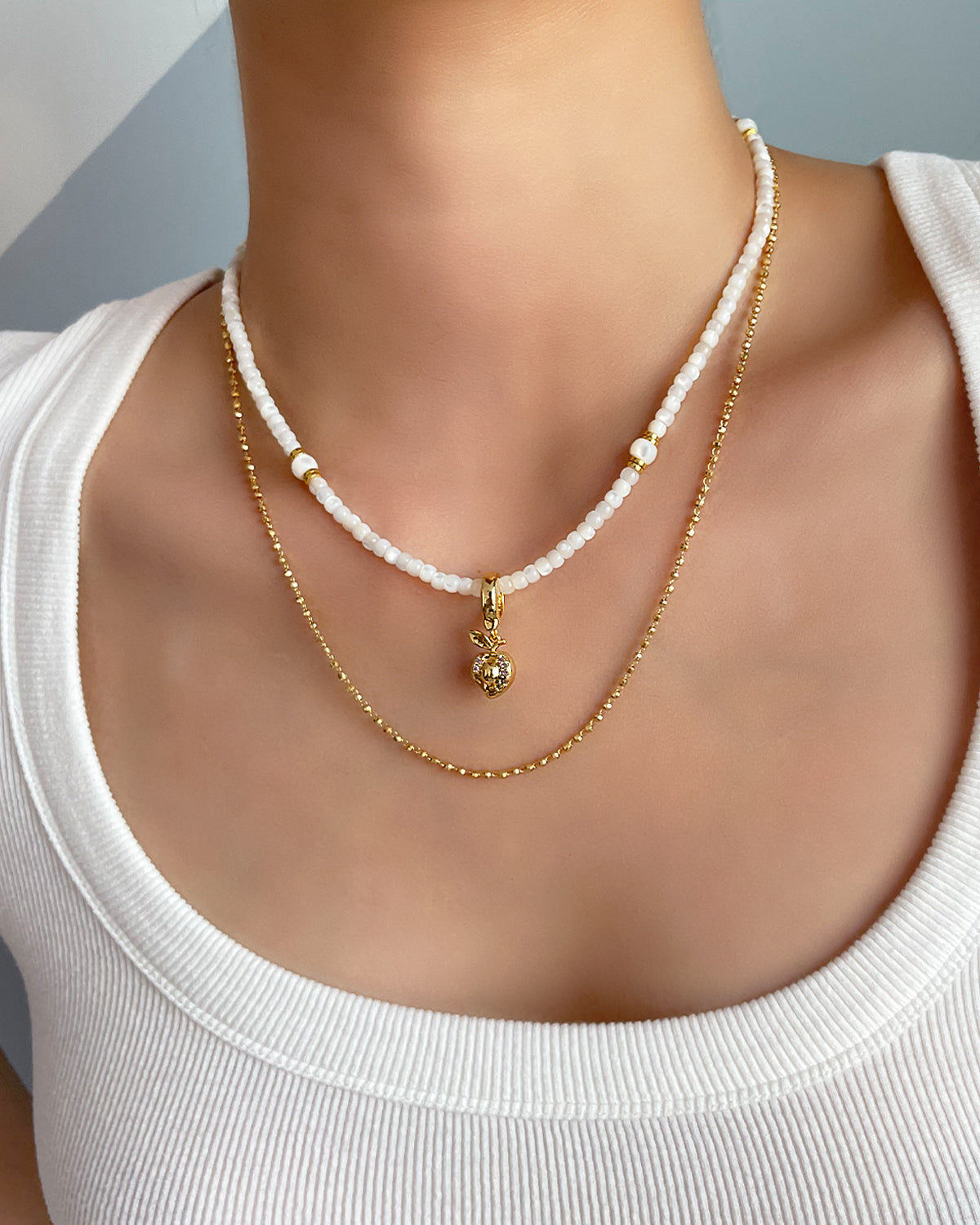 Collier superposé pour amoureux des fruits en coquille de Trochus